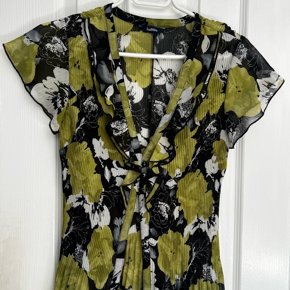 Green and black frilly top